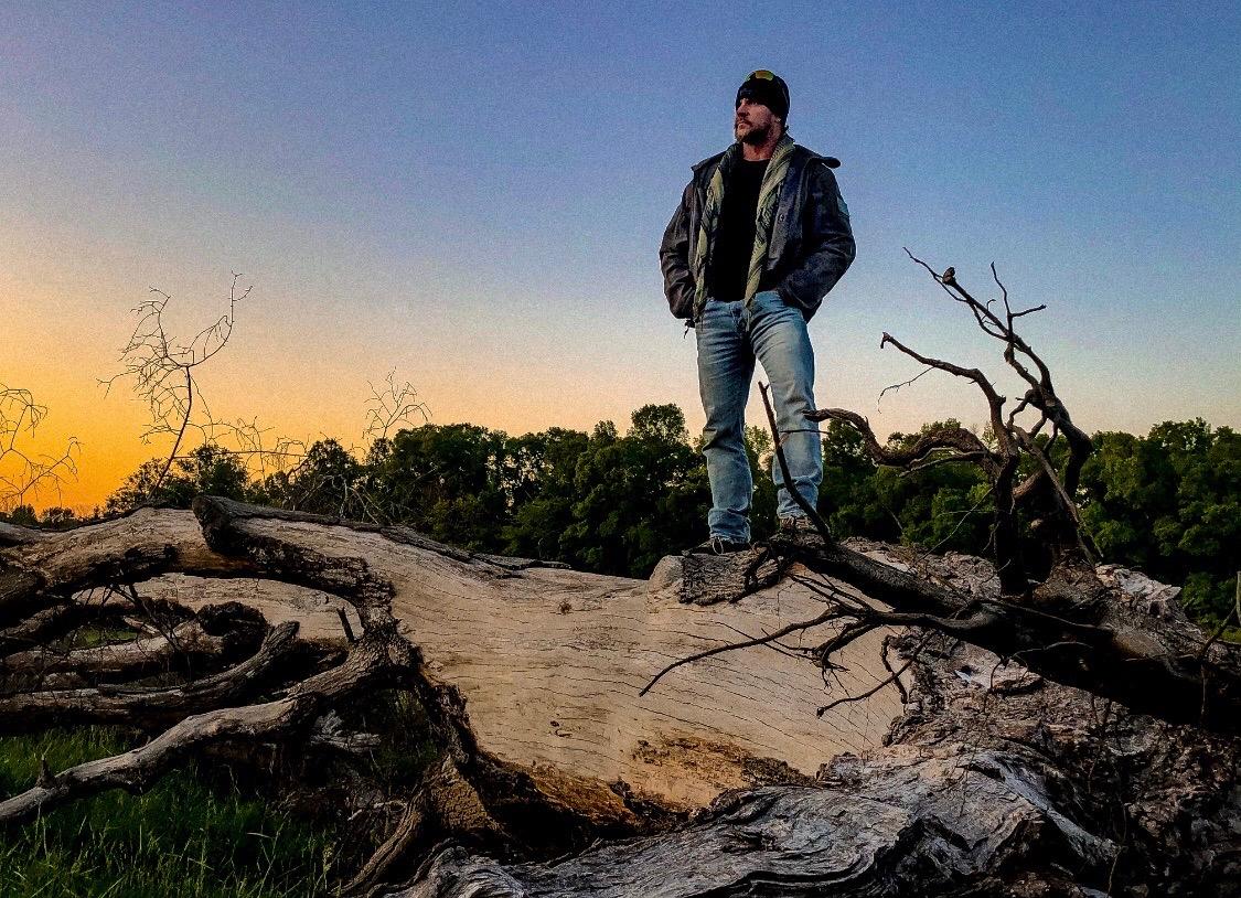 Joseph Standing on Mountain