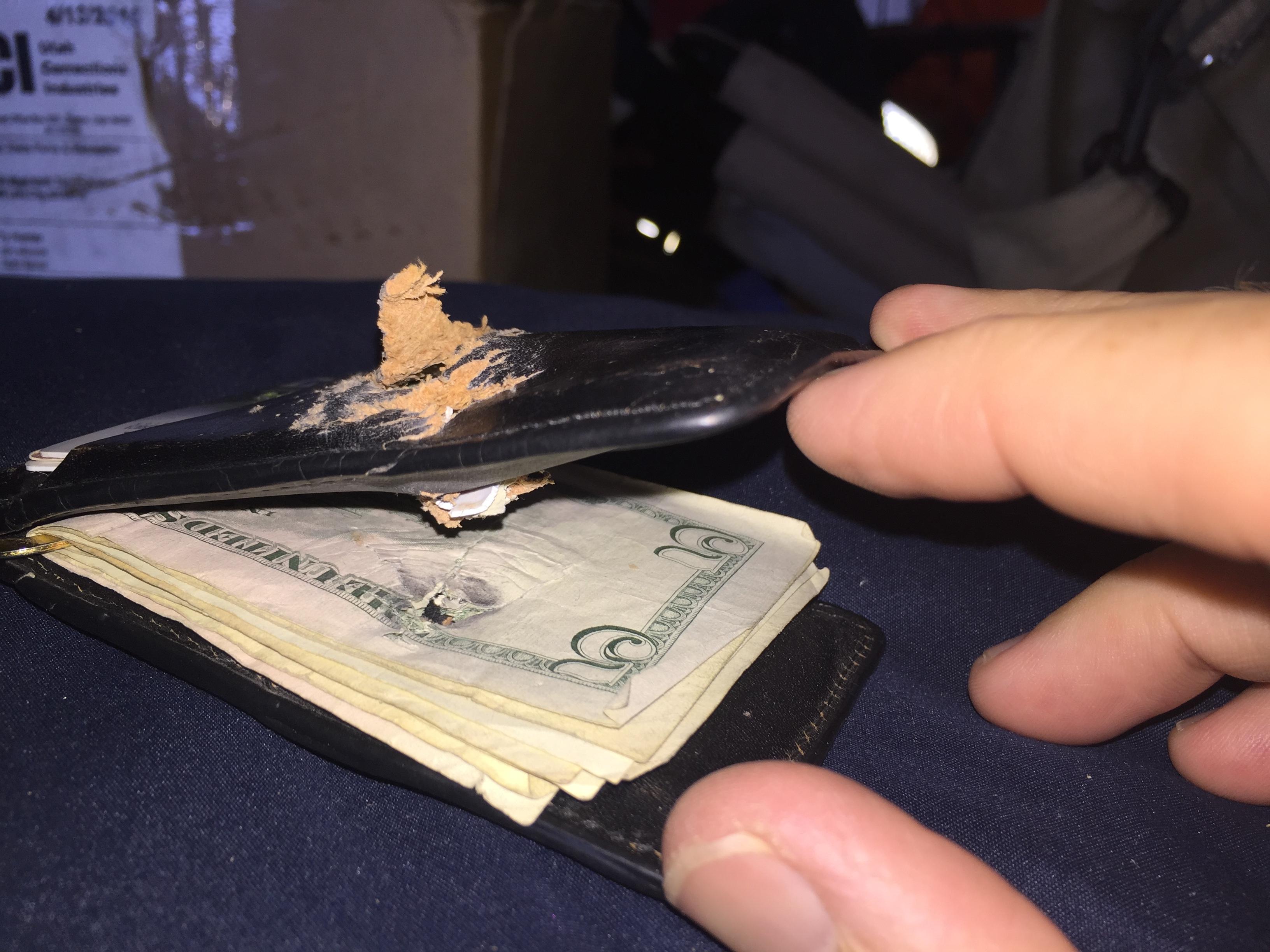 bullet traveling through wallet