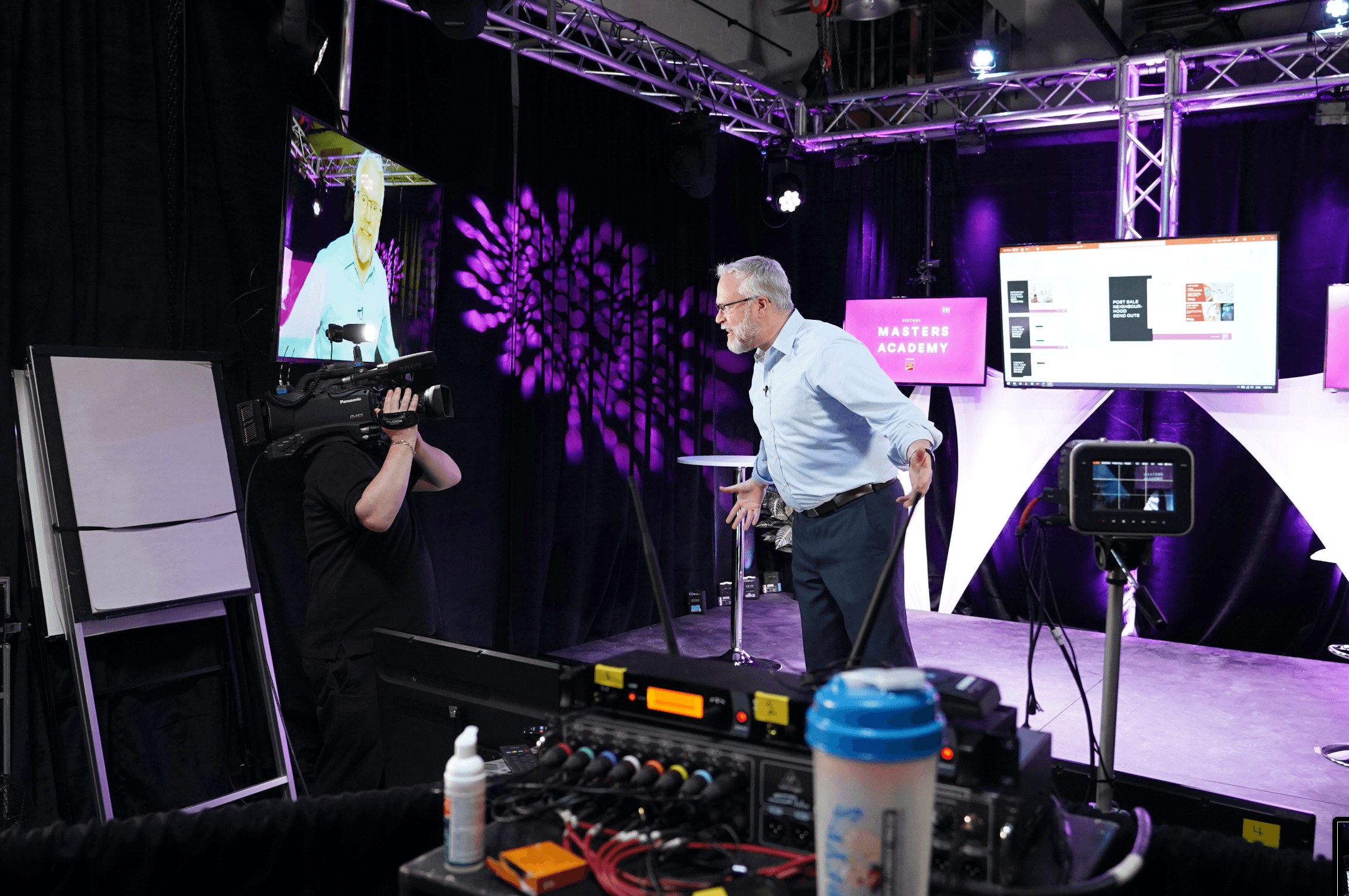 Chris engaging direct to camera from stage