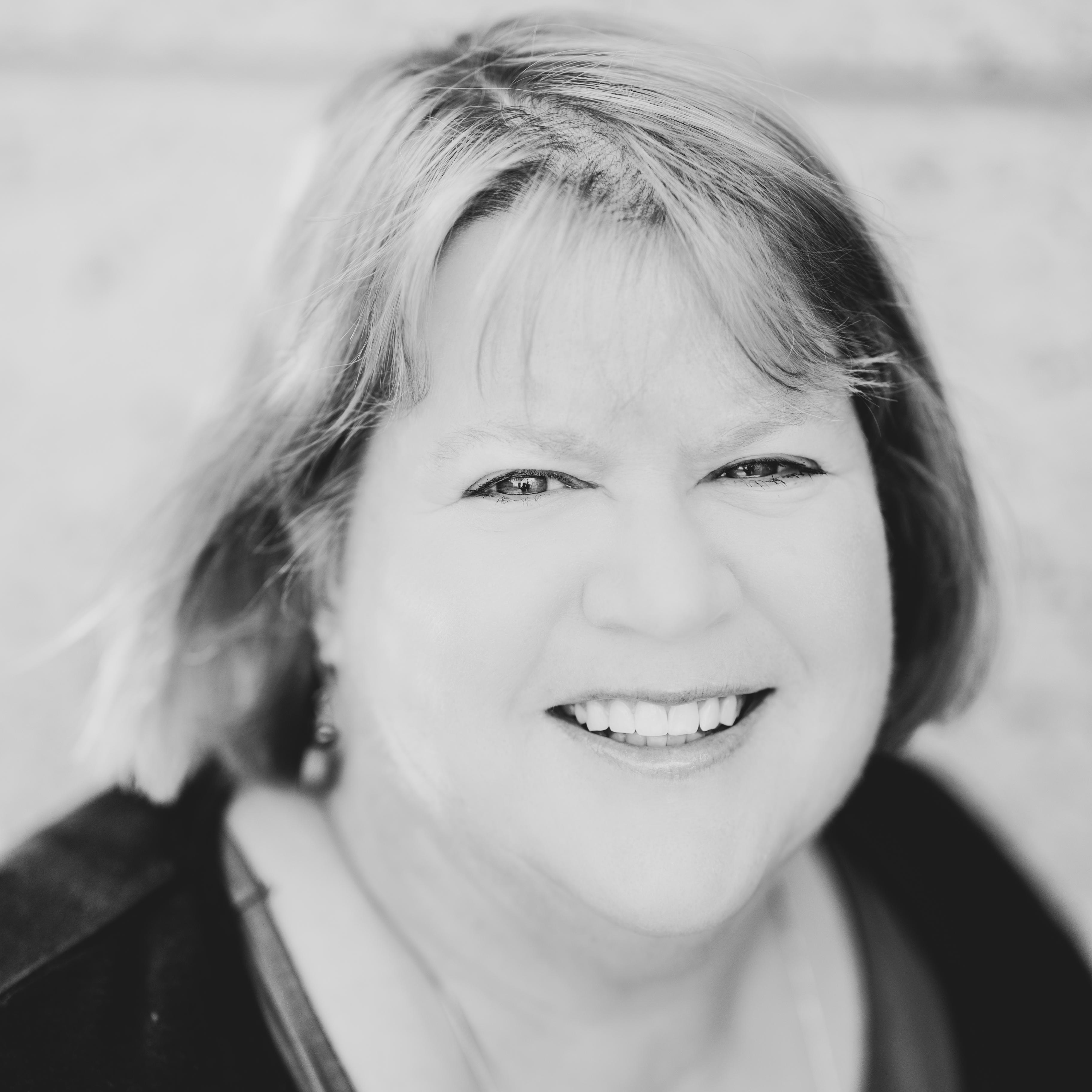 black and white headshot for Dr. Susan Hughes