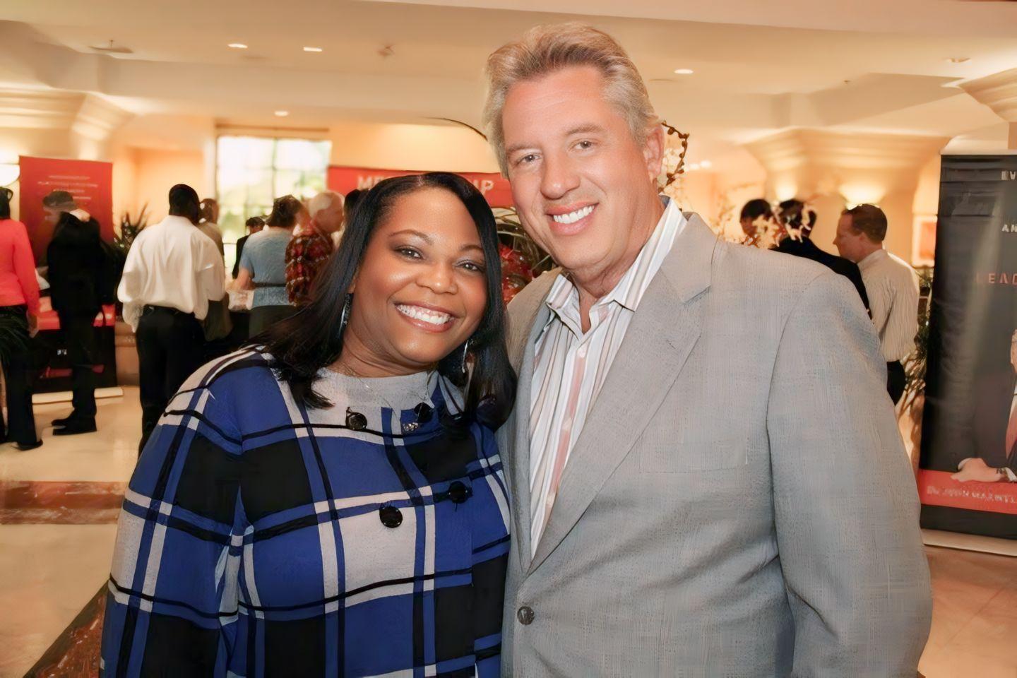 Dr. Khannah Josué with John Maxwell