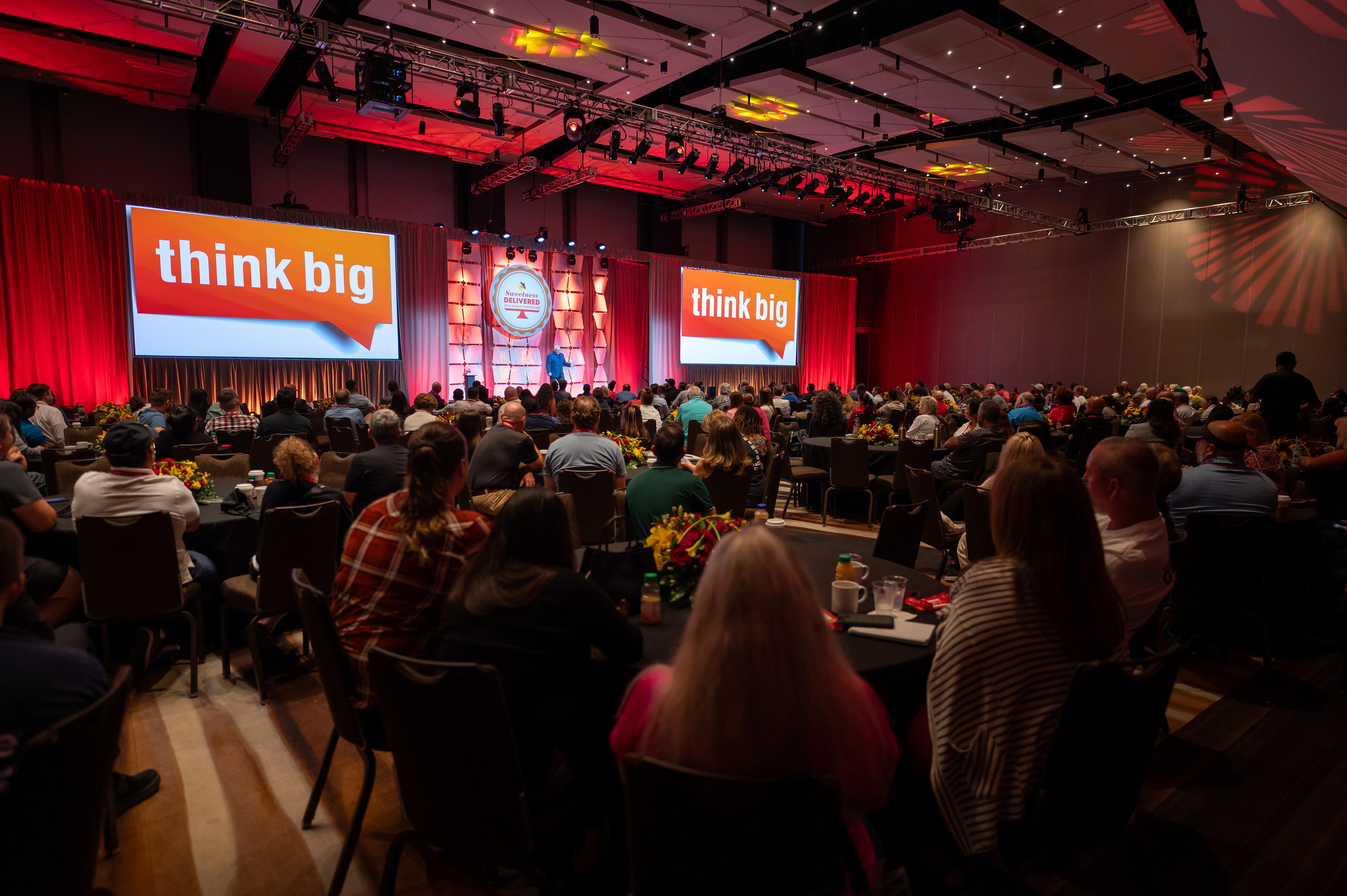 Ford Speaking on Stage - Think Big