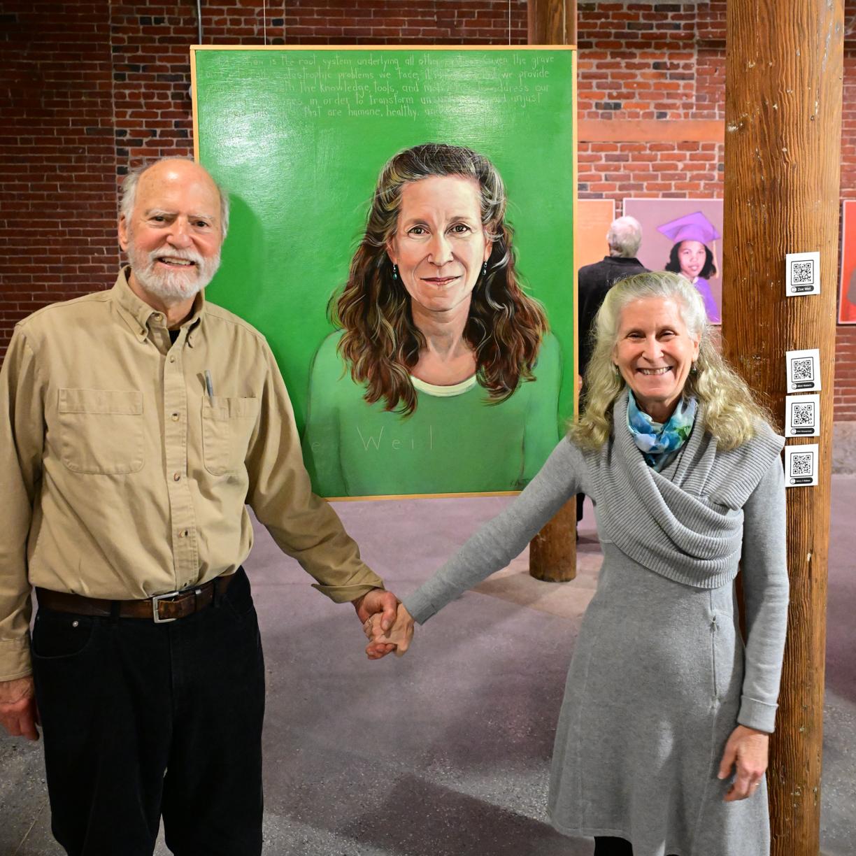 Zoe Weil & Artist Robert Shetterly with the portrait of Zoe for Americans Who Te