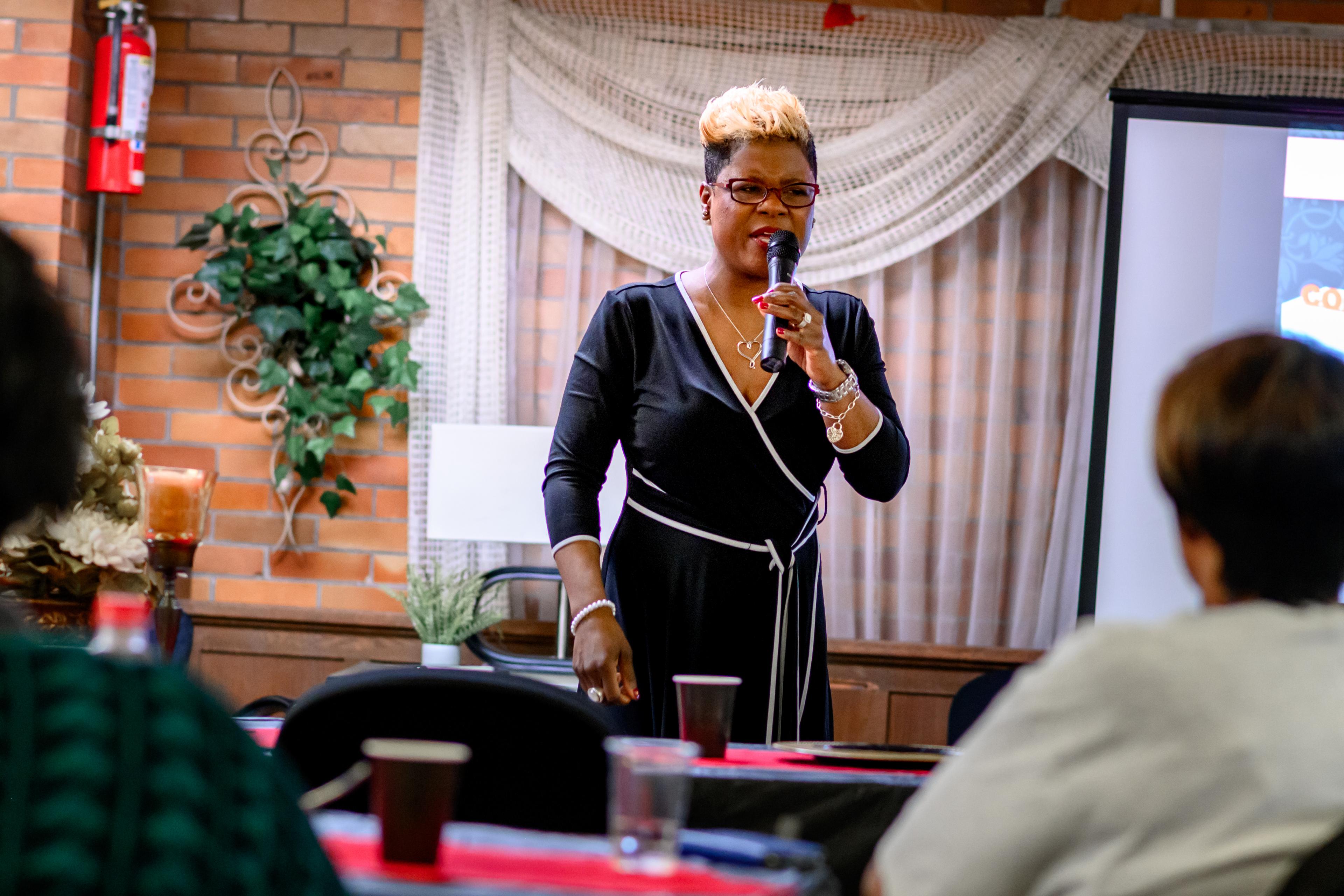 Tiffany Lewis | Side view w/mic | color photo