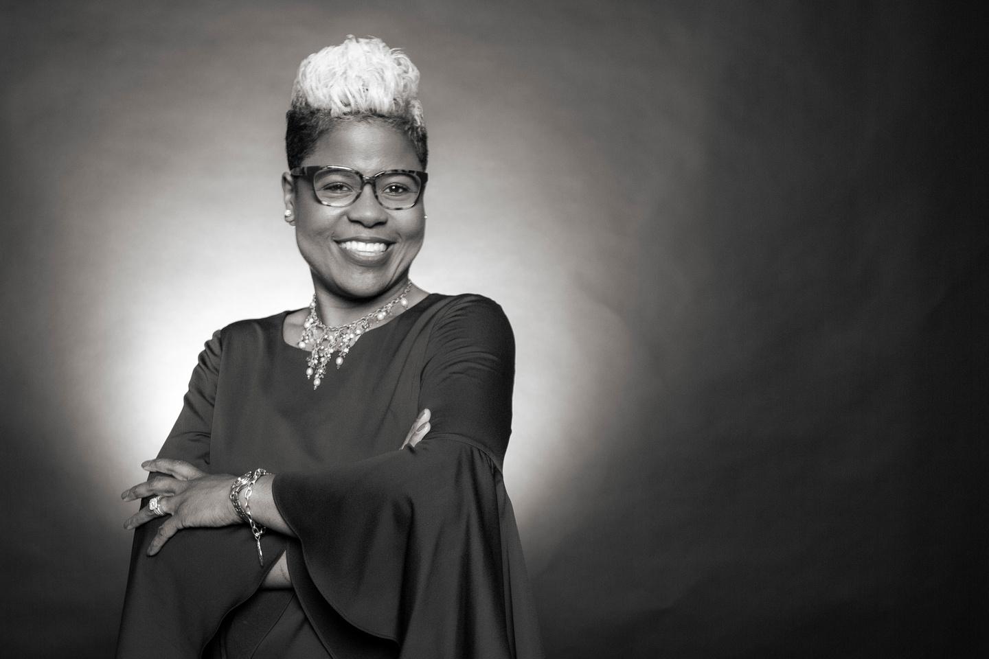 Tiffany Lewis | hands crossed | black & white photo