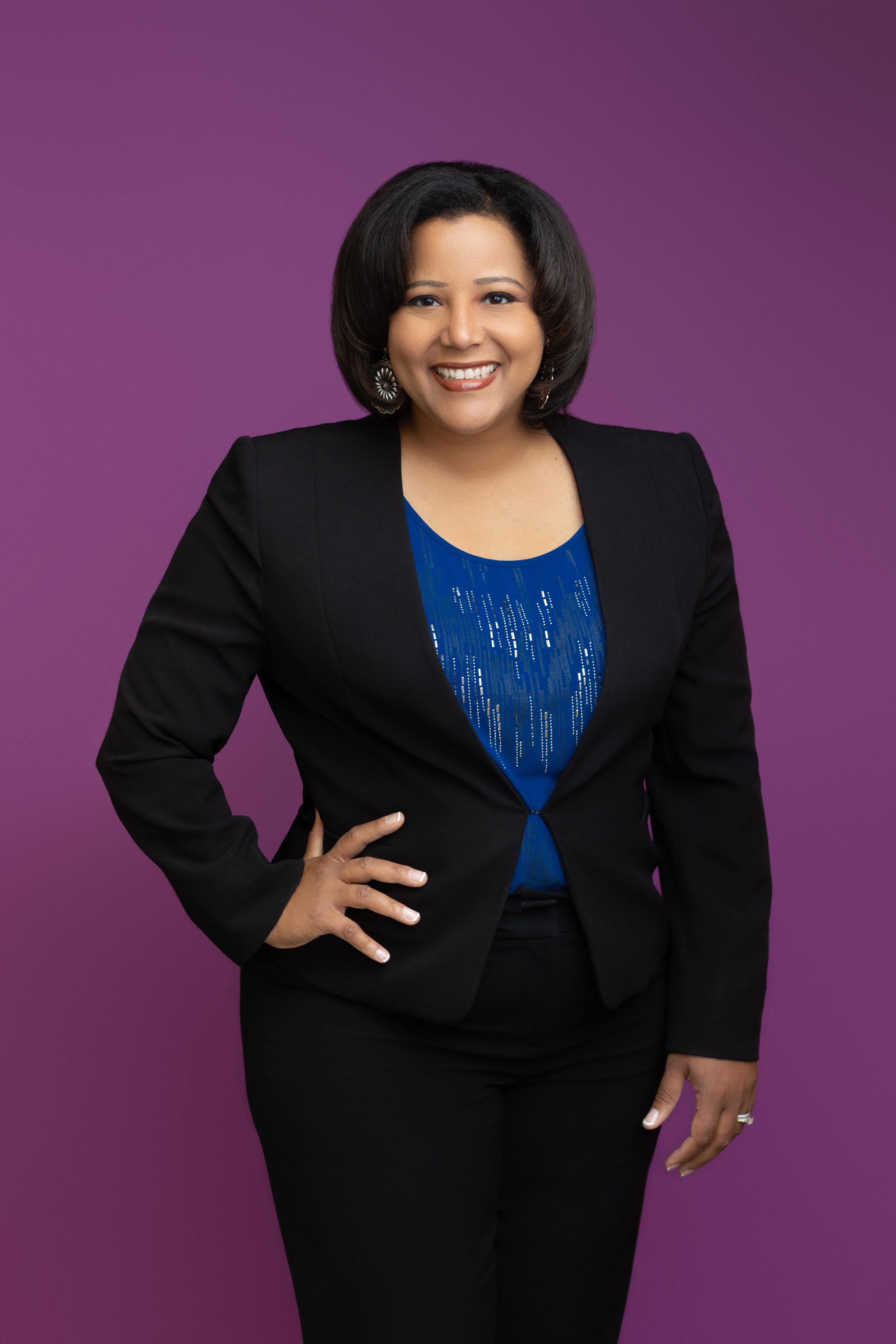 JJ Conway Black Suit Purple Background 2022