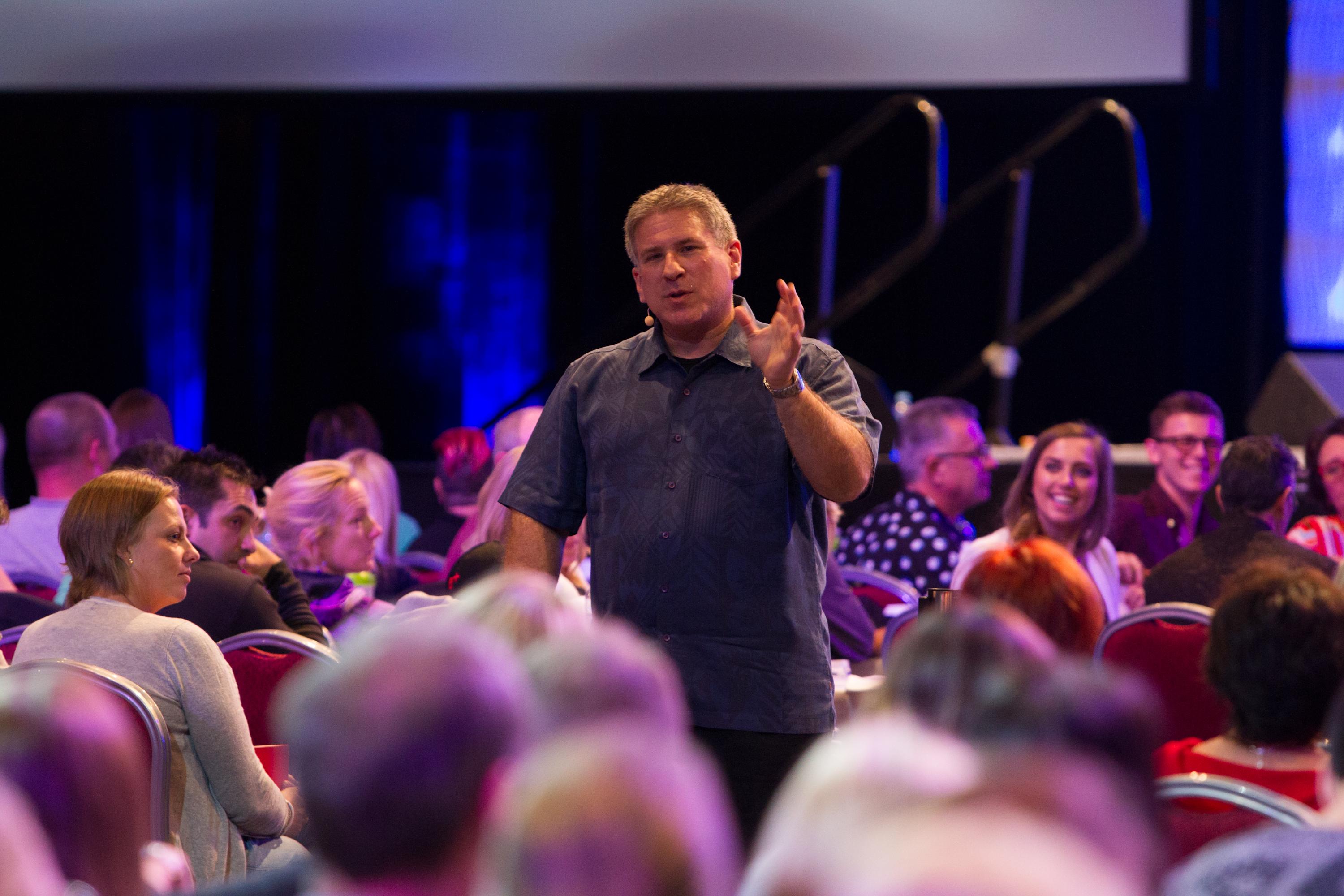 Farber speaking to large group Australia
