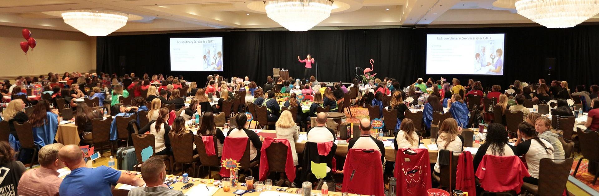 Barbara Khozam on stage during presentation