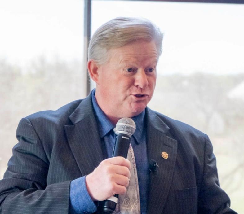 J LOREN NORRIS SPEAKING AT LAS COLINAS COUNTRY CLUB