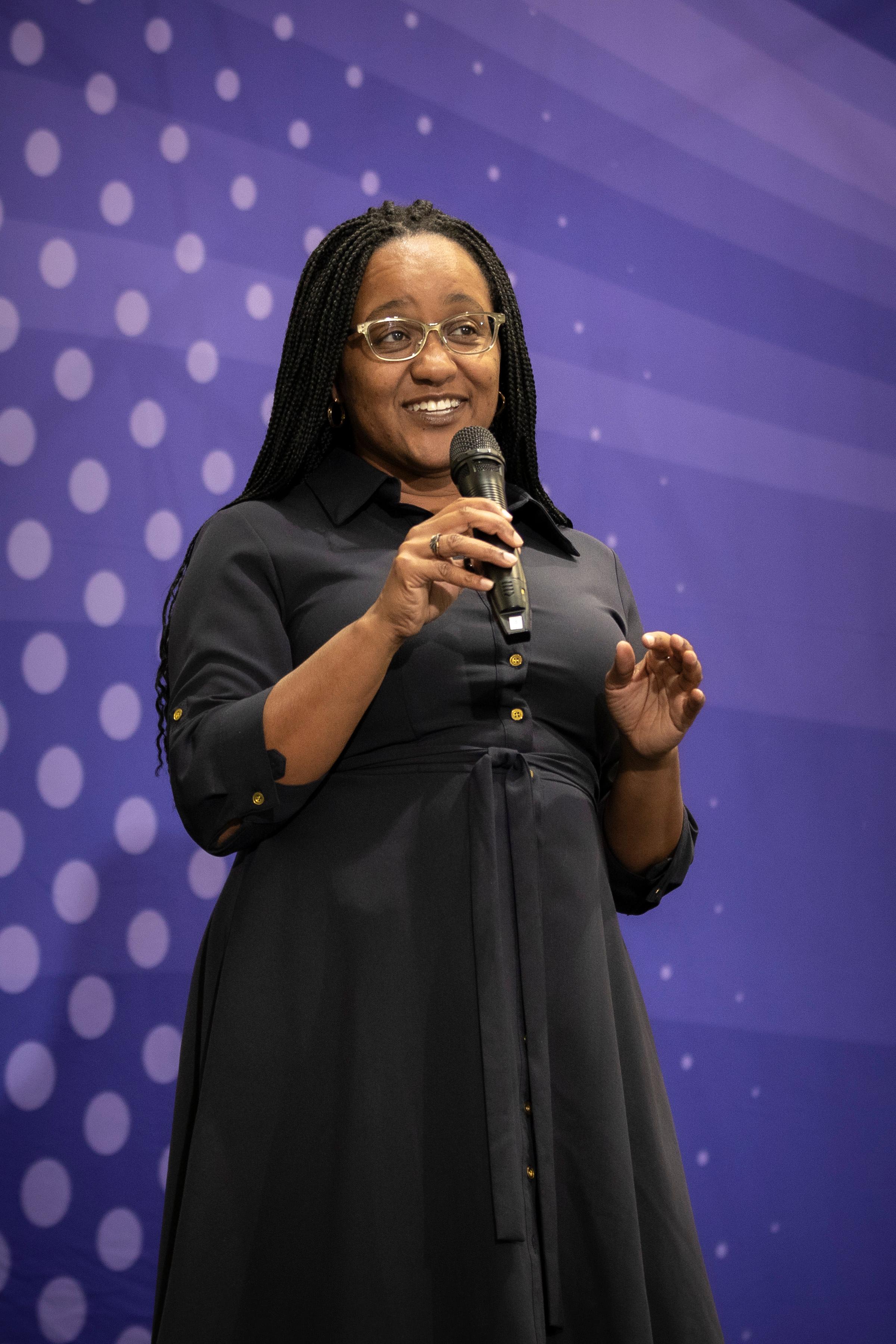 Dr. Heather (Speaking, smiling)